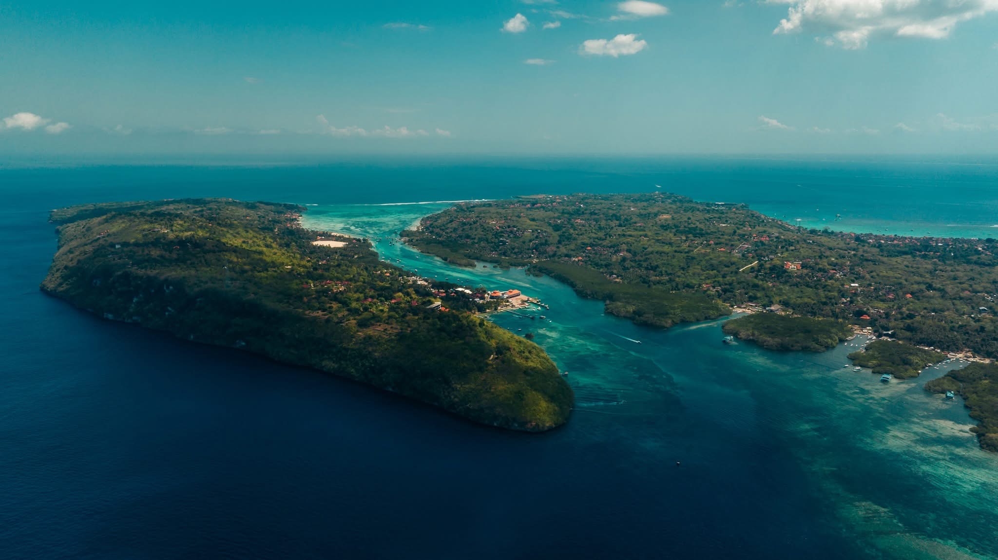 Island channel aerial, Bali — destination photography by Samuel John Ford
