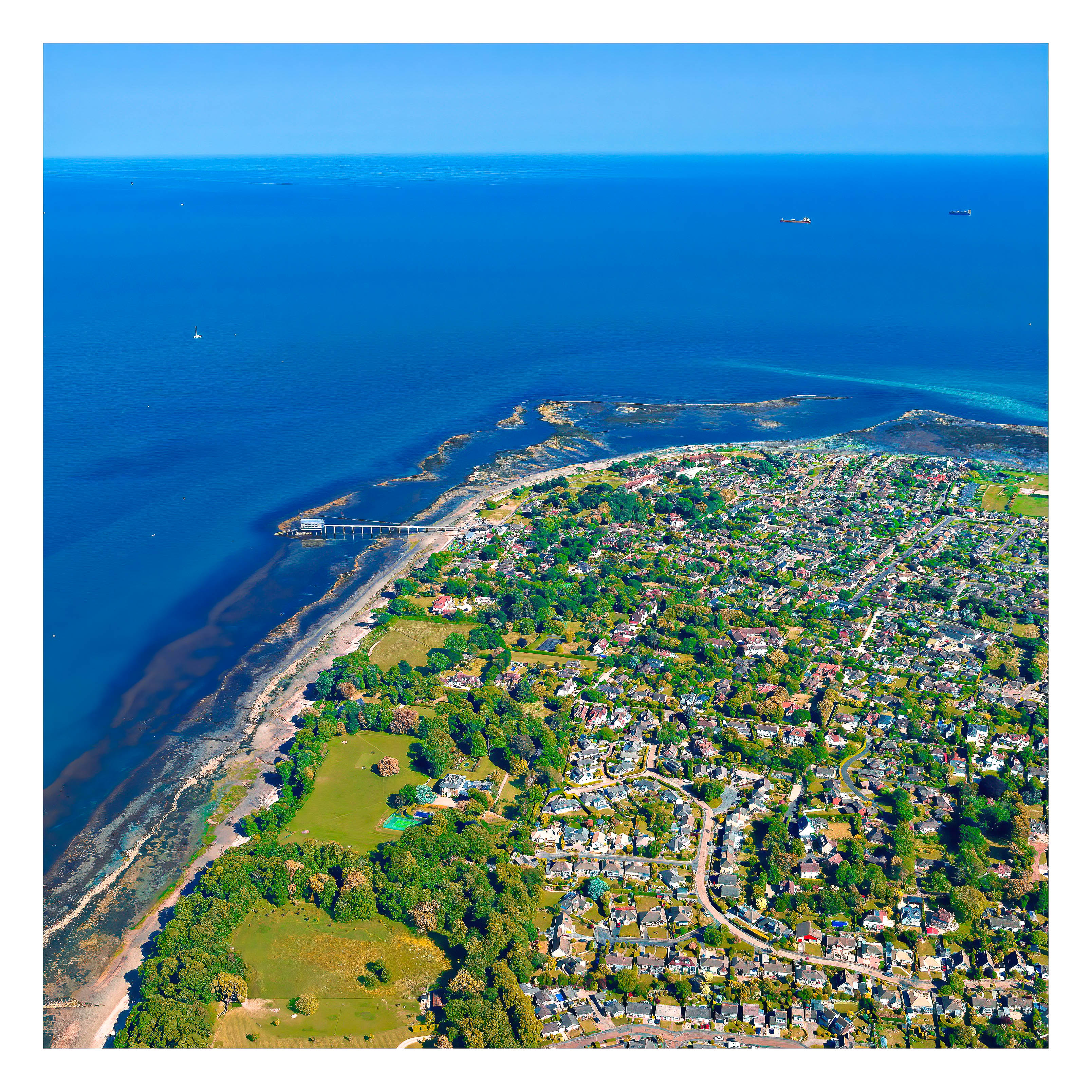 Coastal town and pier from the air, Isle of Wight — destination photography by Samuel John Ford
