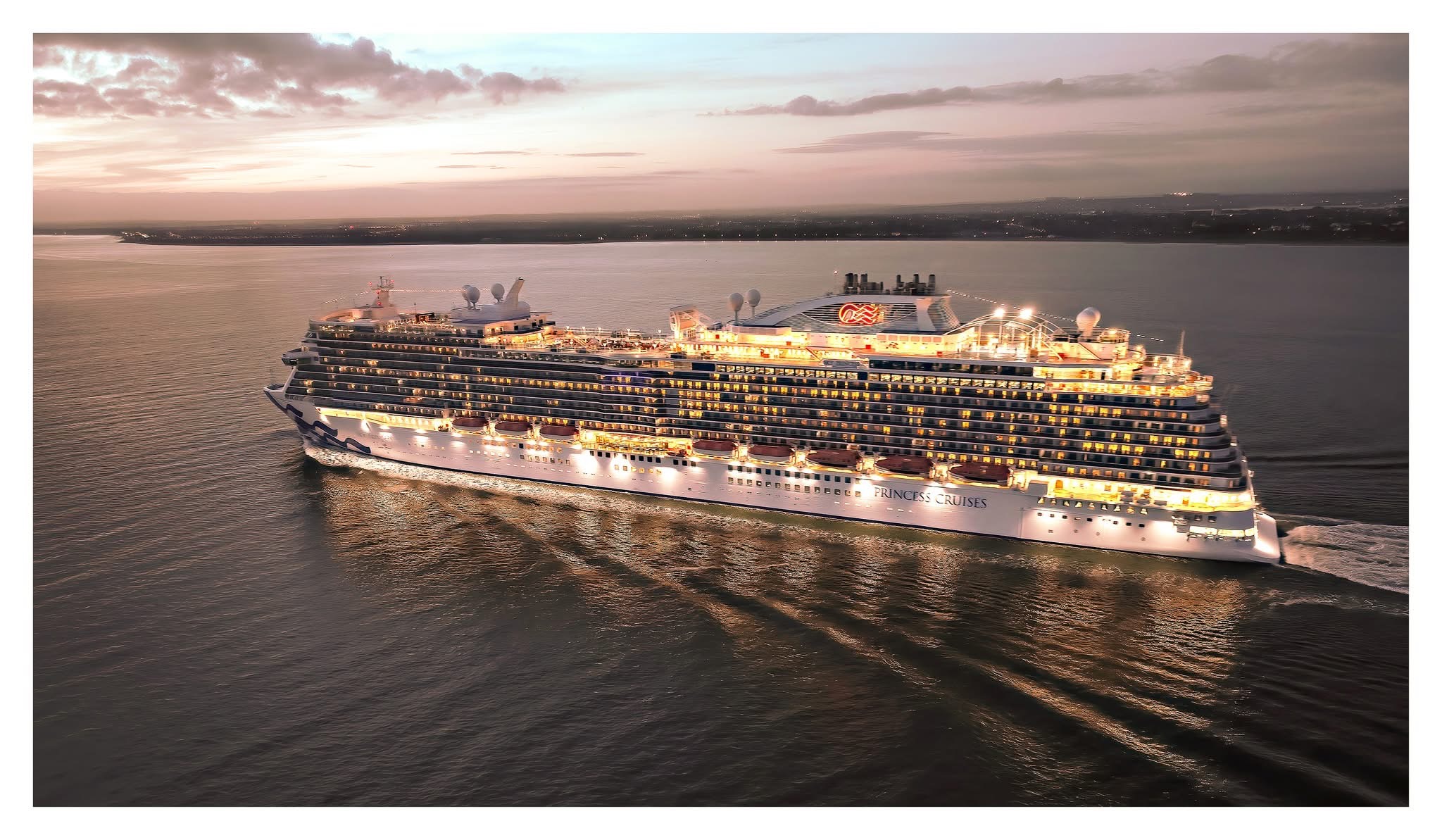 Cruise ship at dusk from the harbour — travel and hospitality photography by Samuel John Ford