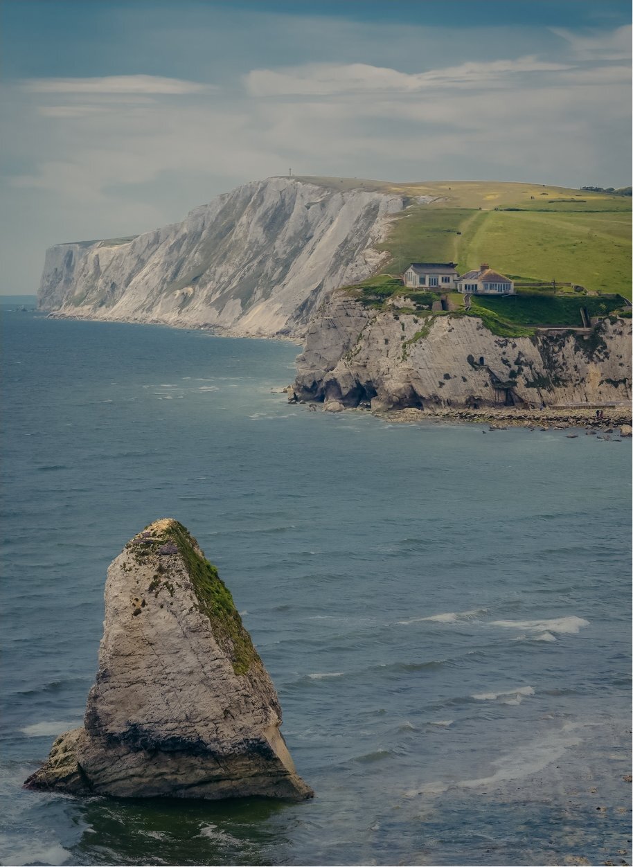 Freshwater Bay sea stack and white chalk cliffs with clifftop cottage, Isle of Wight — landscape photography by Samuel John Ford